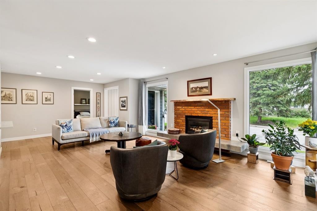 5689 Brenner Crescent Nw, Calgary, AB - Indoor Photo Showing Living Room With Fireplace