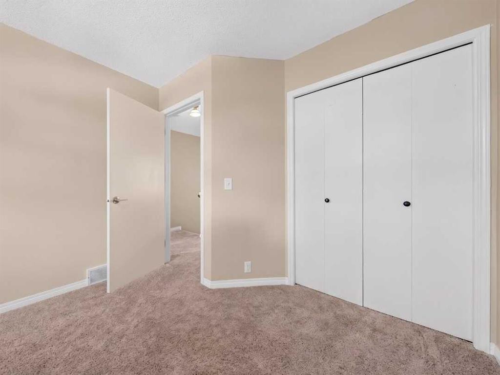 125 Coverton Circle Ne, Calgary, AB - Indoor Photo Showing Other Room
