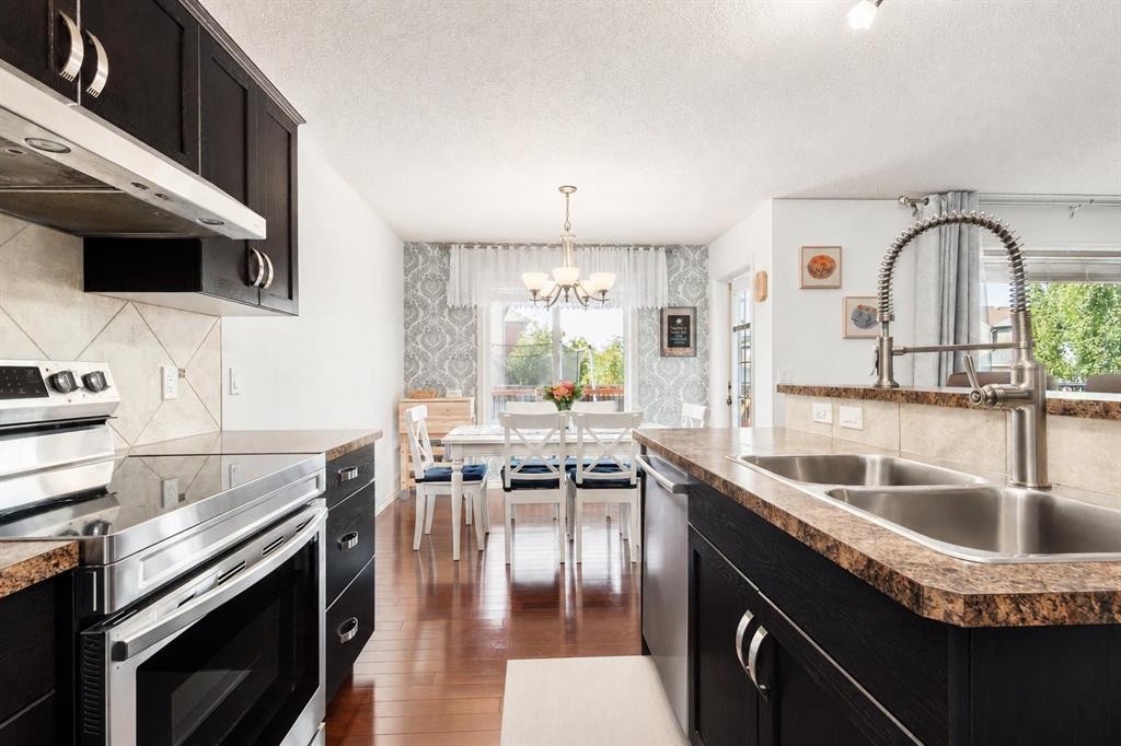 821 Auburn Bay Boulevard Se, Calgary, AB - Indoor Photo Showing Kitchen With Double Sink With Upgraded Kitchen