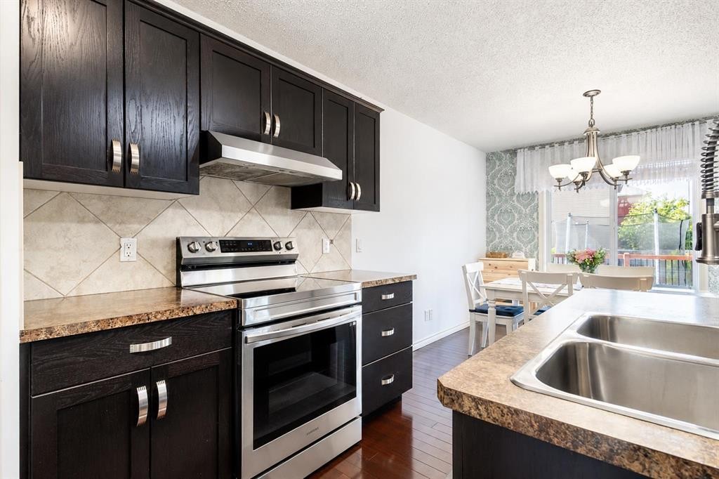 821 Auburn Bay Boulevard Se, Calgary, AB - Indoor Photo Showing Kitchen With Double Sink