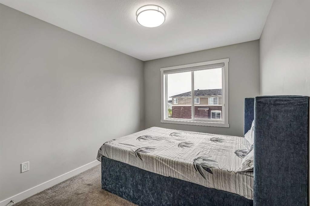 349 Corner Meadows Way Ne, Calgary, AB - Indoor Photo Showing Bedroom