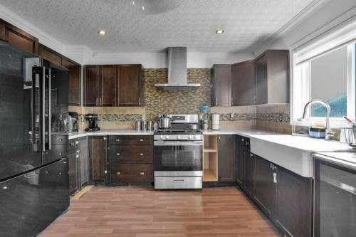 156 Saddlecrest Place Ne, Calgary, AB - Indoor Photo Showing Kitchen With Upgraded Kitchen