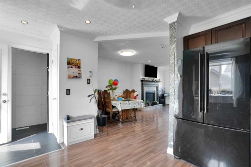156 Saddlecrest Place Ne, Calgary, AB - Indoor With Fireplace