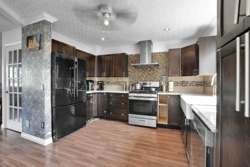 156 Saddlecrest Place Ne, Calgary, AB - Indoor Photo Showing Kitchen With Upgraded Kitchen