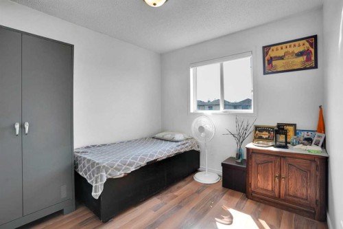 156 Saddlecrest Place Ne, Calgary, AB - Indoor Photo Showing Bedroom
