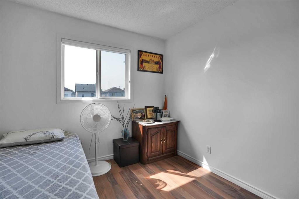 156 Saddlecrest Place Ne, Calgary, AB - Indoor Photo Showing Bedroom
