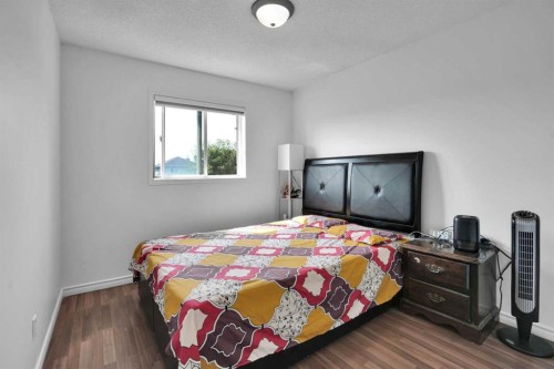 156 Saddlecrest Place Ne, Calgary, AB - Indoor Photo Showing Bedroom