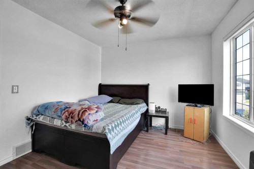 156 Saddlecrest Place Ne, Calgary, AB - Indoor Photo Showing Bedroom