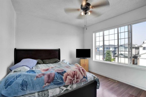156 Saddlecrest Place Ne, Calgary, AB - Indoor Photo Showing Bedroom