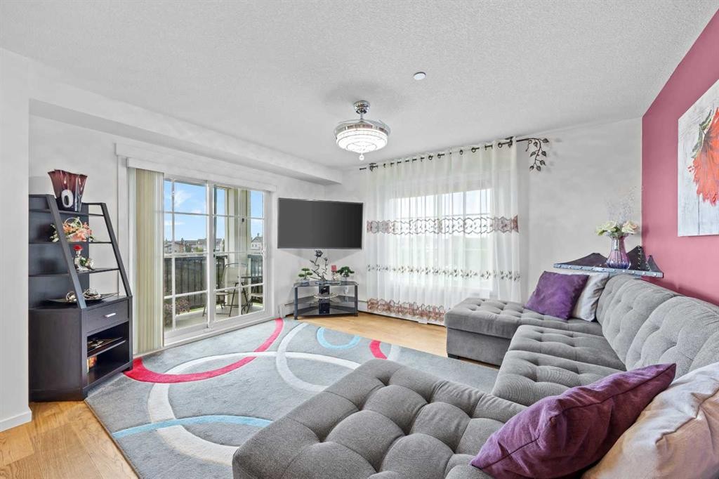 5309-755 Copperpond Boulevard Se, Calgary, AB - Indoor Photo Showing Living Room