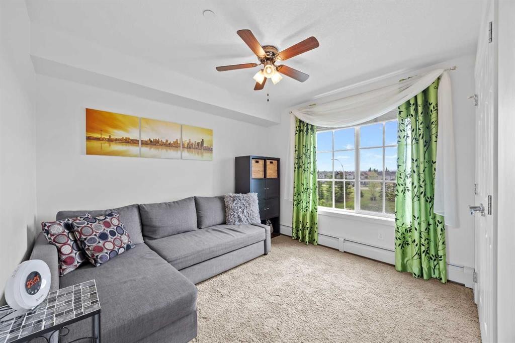 5309-755 Copperpond Boulevard Se, Calgary, AB - Indoor Photo Showing Living Room