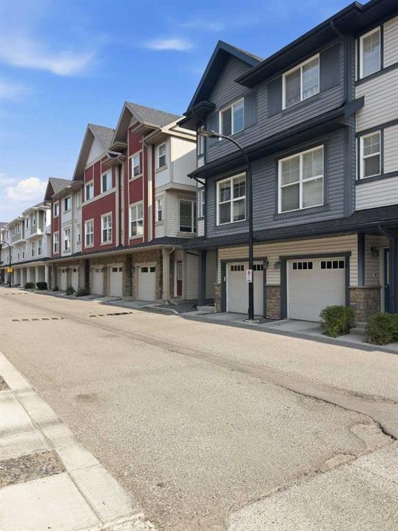 28 New Brighton Point Se, Calgary, AB - Outdoor With Facade
