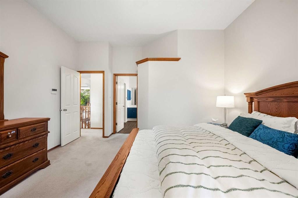 125 Woodpark Close Sw, Calgary, AB - Indoor Photo Showing Bedroom