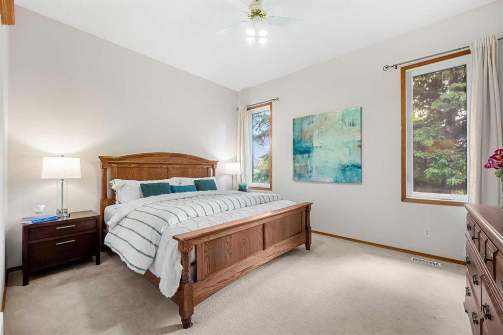 125 Woodpark Close Sw, Calgary, AB - Indoor Photo Showing Bedroom