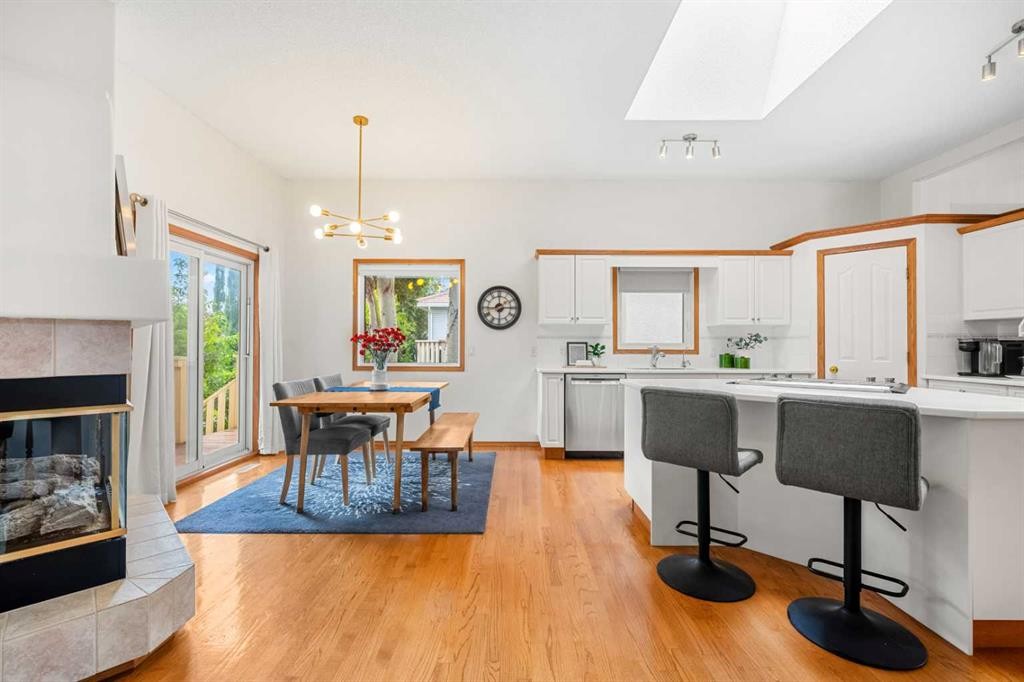 125 Woodpark Close Sw, Calgary, AB - Indoor With Fireplace