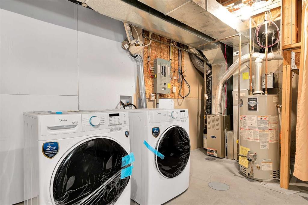 86 Country Village Gate Ne, Calgary, AB - Indoor Photo Showing Laundry Room