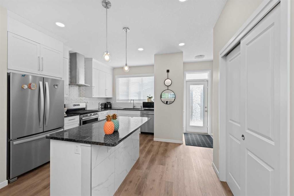59 Cornerbrook Avenue Ne, Calgary, AB - Indoor Photo Showing Kitchen With Upgraded Kitchen