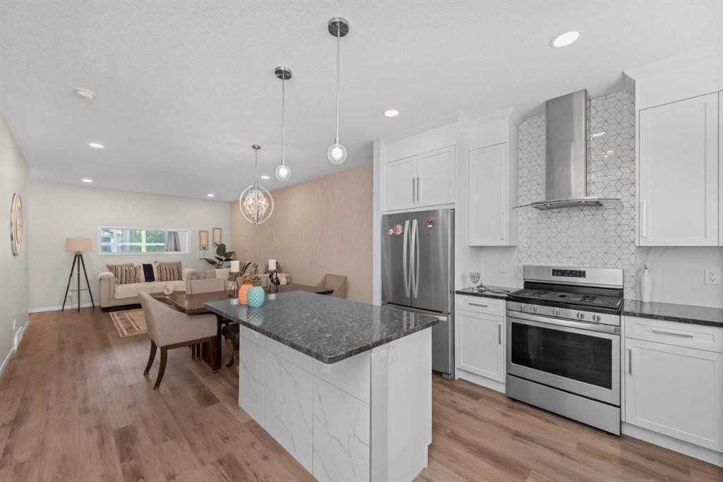 59 Cornerbrook Avenue Ne, Calgary, AB - Indoor Photo Showing Kitchen With Stainless Steel Kitchen With Upgraded Kitchen