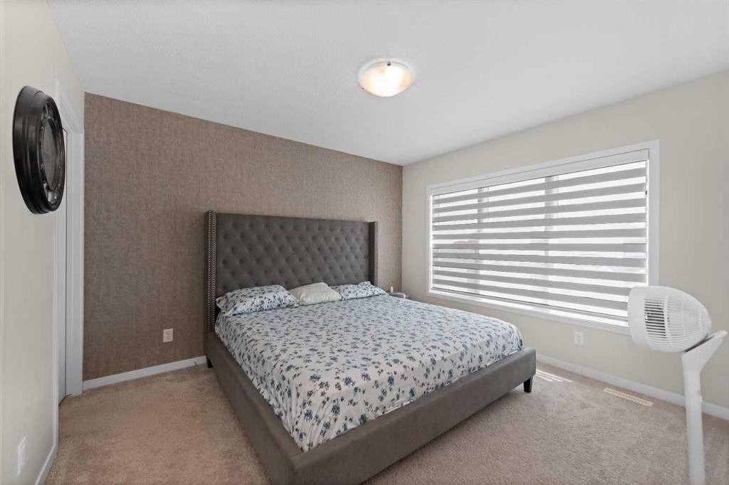 59 Cornerbrook Avenue Ne, Calgary, AB - Indoor Photo Showing Bedroom