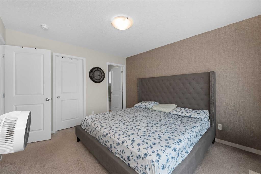 59 Cornerbrook Avenue Ne, Calgary, AB - Indoor Photo Showing Bedroom