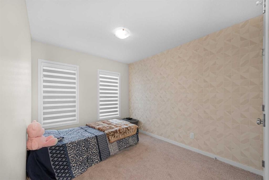 59 Cornerbrook Avenue Ne, Calgary, AB - Indoor Photo Showing Bedroom