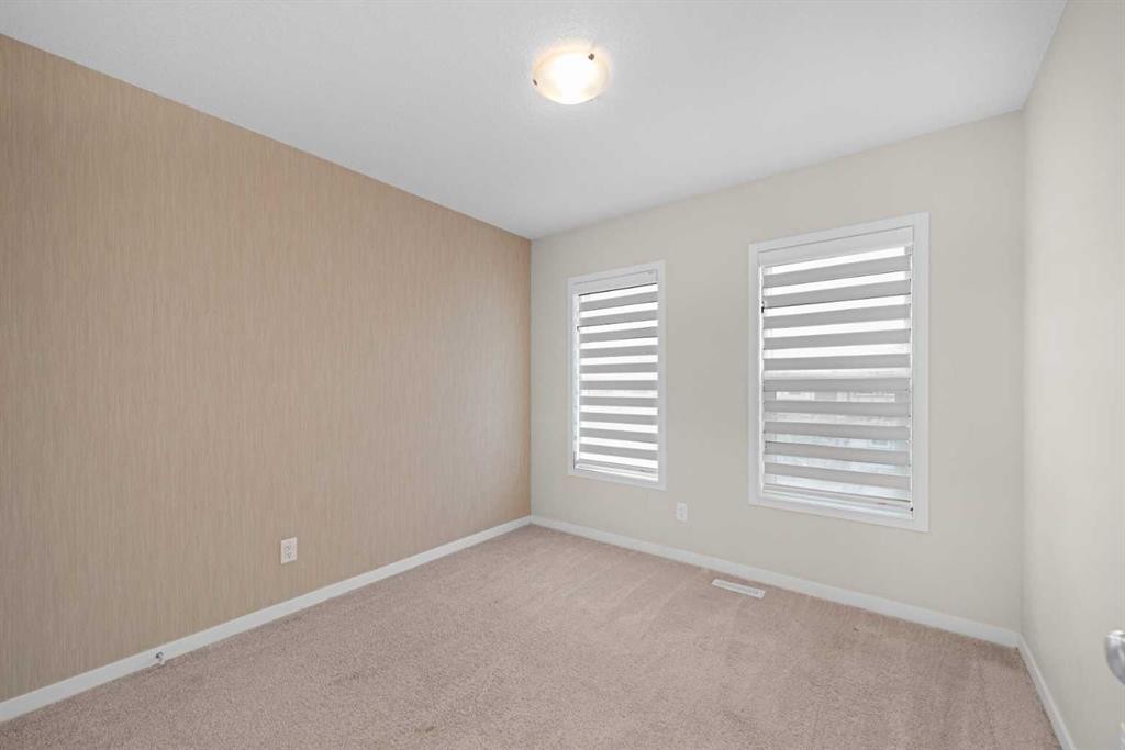 59 Cornerbrook Avenue Ne, Calgary, AB - Indoor Photo Showing Other Room