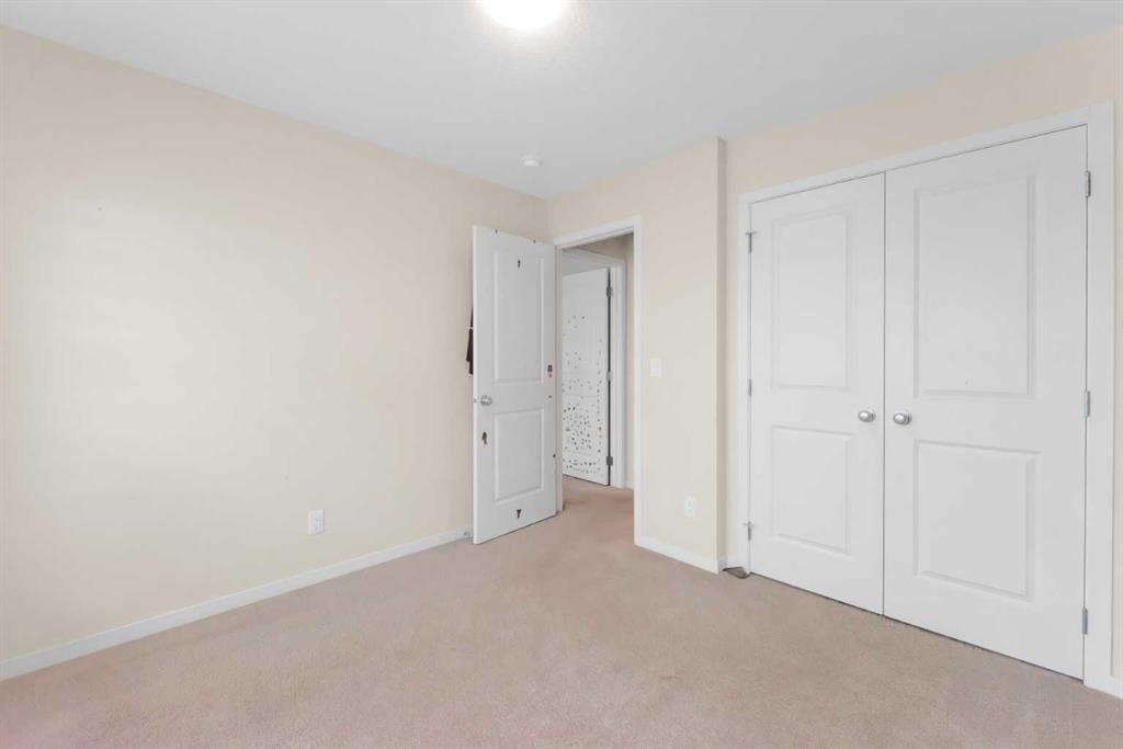59 Cornerbrook Avenue Ne, Calgary, AB - Indoor Photo Showing Other Room
