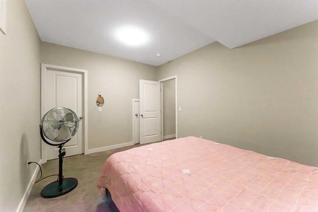 59 Cornerbrook Avenue Ne, Calgary, AB - Indoor Photo Showing Bedroom