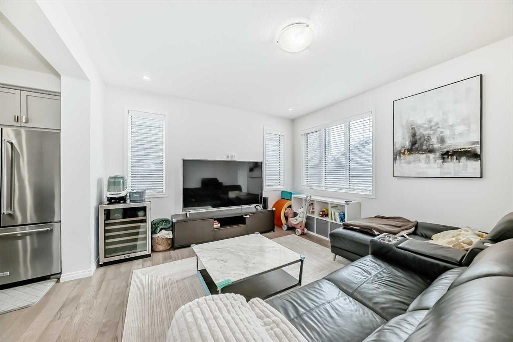 372 Carrington Way Nw, Calgary, AB - Indoor Photo Showing Living Room