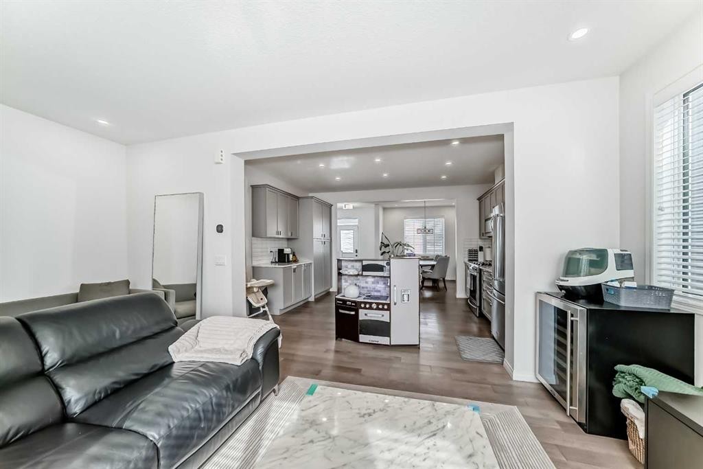 372 Carrington Way Nw, Calgary, AB - Indoor Photo Showing Living Room