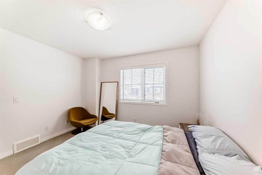 372 Carrington Way Nw, Calgary, AB - Indoor Photo Showing Bedroom