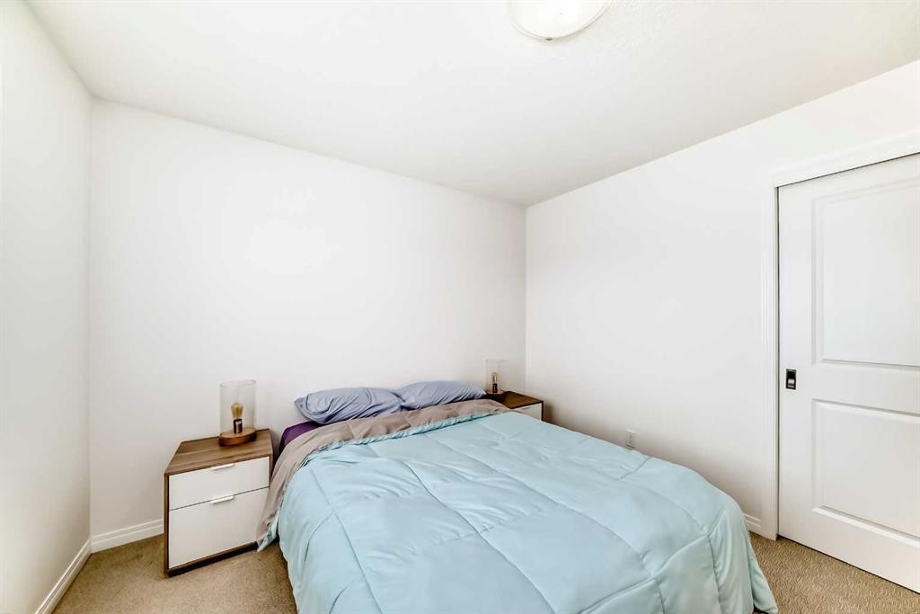 372 Carrington Way Nw, Calgary, AB - Indoor Photo Showing Bedroom
