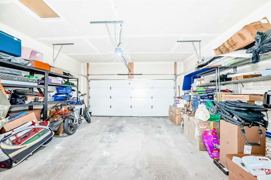 372 Carrington Way Nw, Calgary, AB - Indoor Photo Showing Garage
