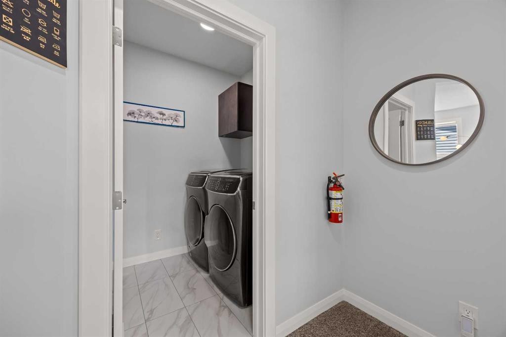 195 Evansfield Close Nw, Calgary, AB - Indoor Photo Showing Laundry Room
