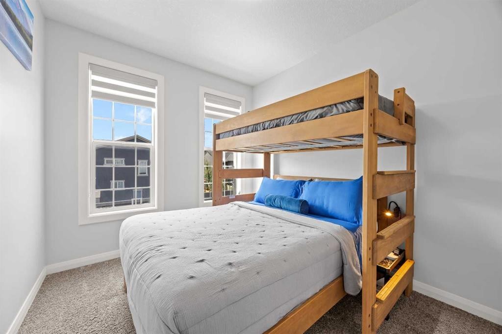 195 Evansfield Close Nw, Calgary, AB - Indoor Photo Showing Bedroom
