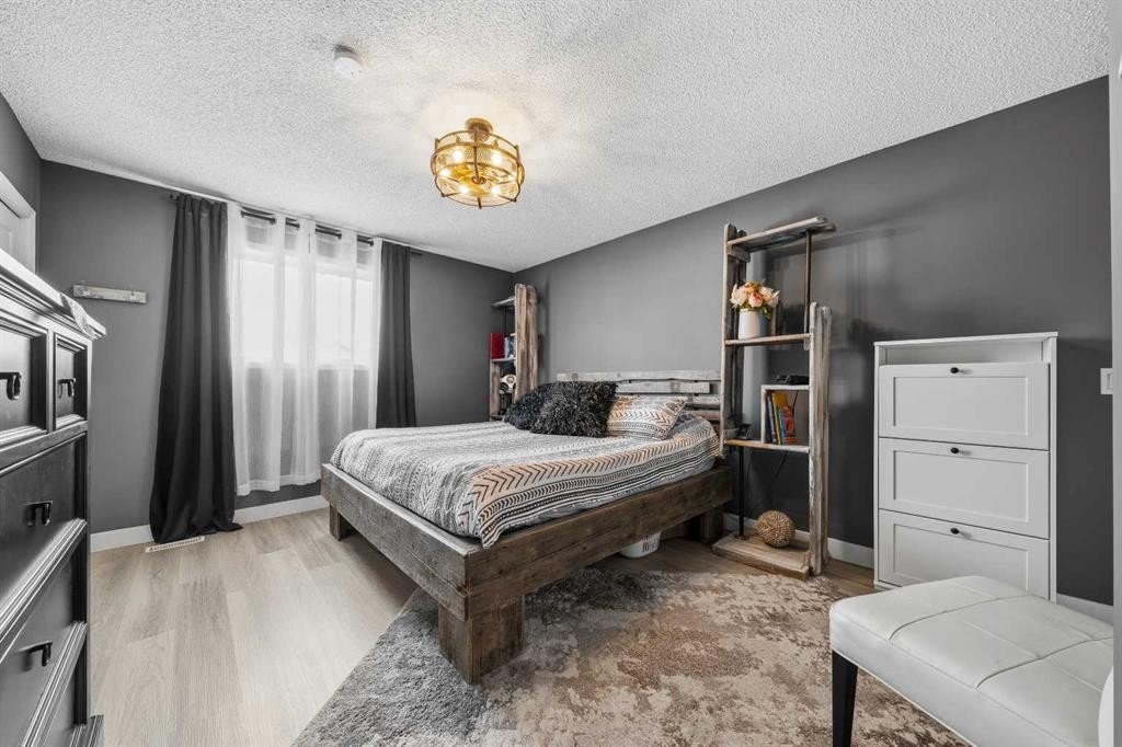 119 Applemont Close Se, Calgary, AB - Indoor Photo Showing Bedroom