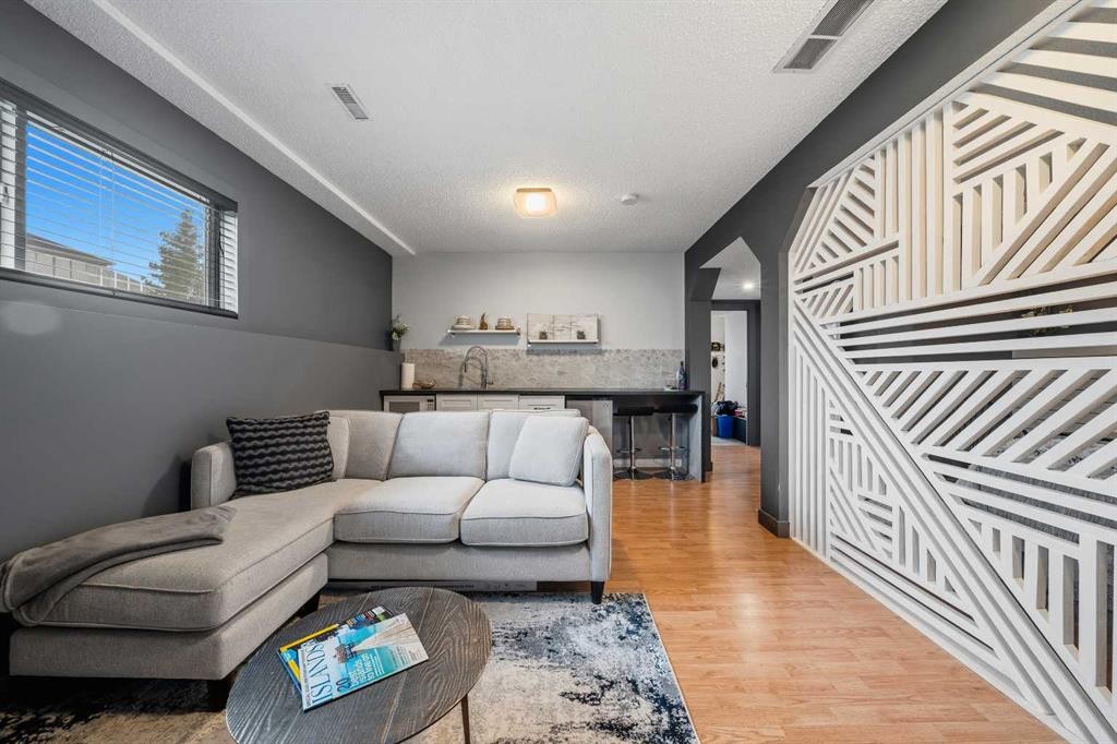 119 Applemont Close Se, Calgary, AB - Indoor Photo Showing Living Room