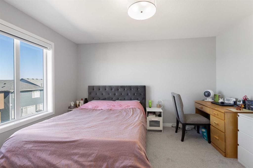35 Lucas Passage Nw, Calgary, AB - Indoor Photo Showing Bedroom