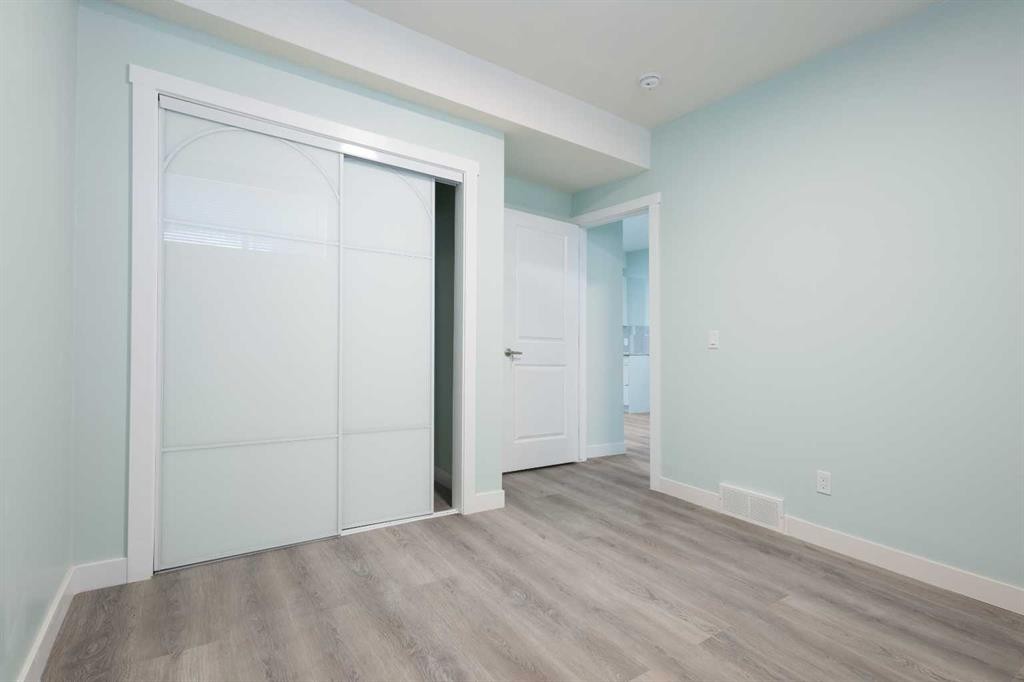35 Lucas Passage Nw, Calgary, AB - Indoor Photo Showing Other Room