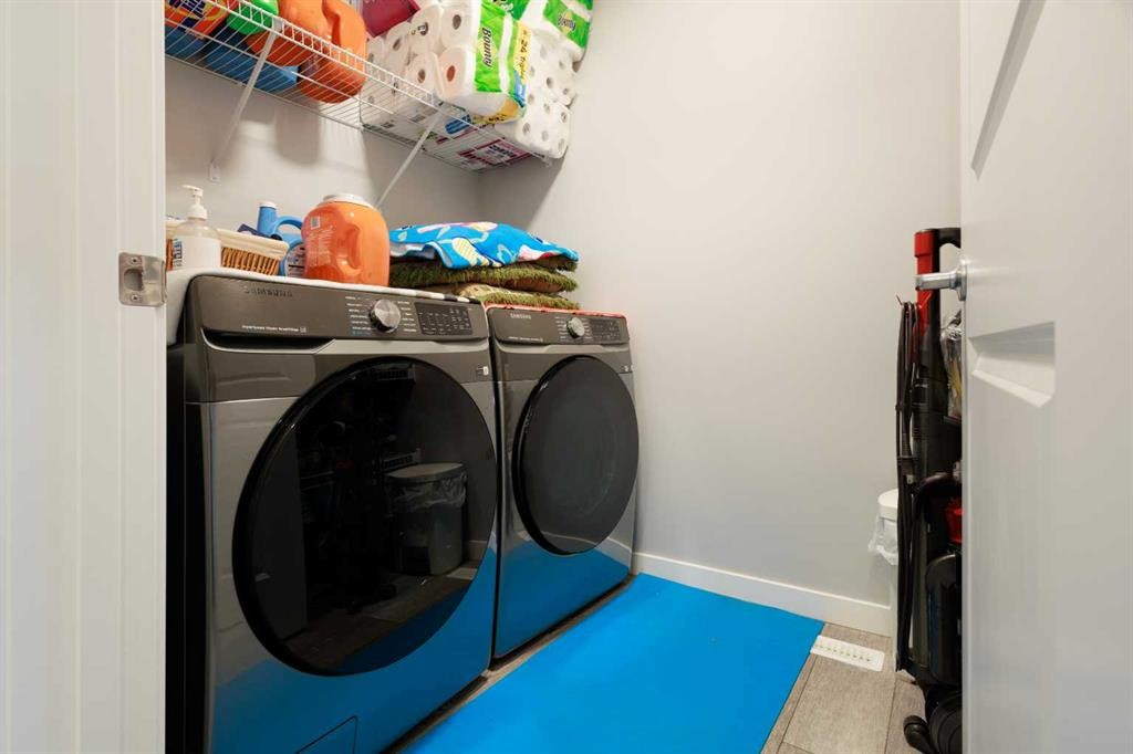 35 Lucas Passage Nw, Calgary, AB - Indoor Photo Showing Laundry Room