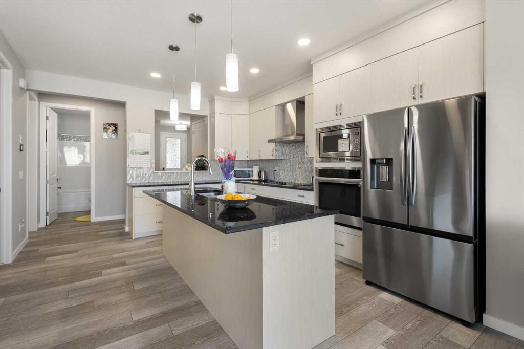 35 Lucas Passage Nw, Calgary, AB - Indoor Photo Showing Kitchen With Stainless Steel Kitchen With Upgraded Kitchen