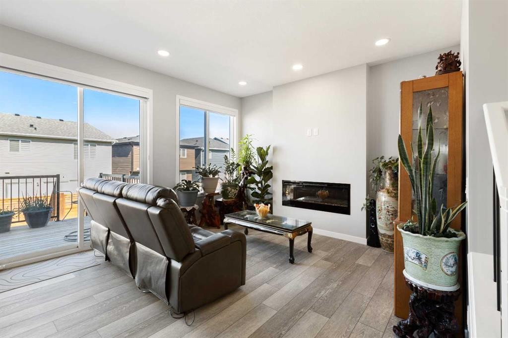 35 Lucas Passage Nw, Calgary, AB - Indoor With Fireplace
