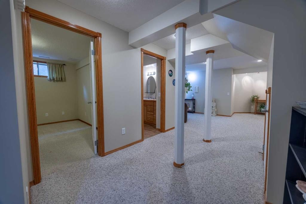 19 Mckenzie Lake Manor Se, Calgary, AB - Indoor Photo Showing Other Room