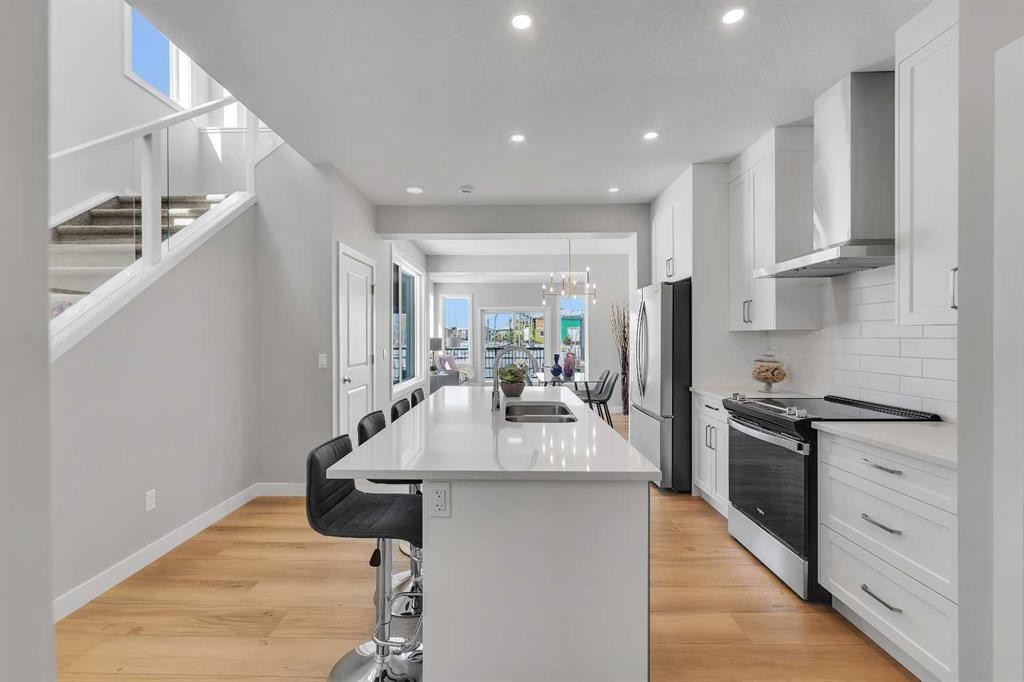 390 South Shore Drive, Chestermere, AB - Indoor Photo Showing Kitchen With Stainless Steel Kitchen With Double Sink With Upgraded Kitchen