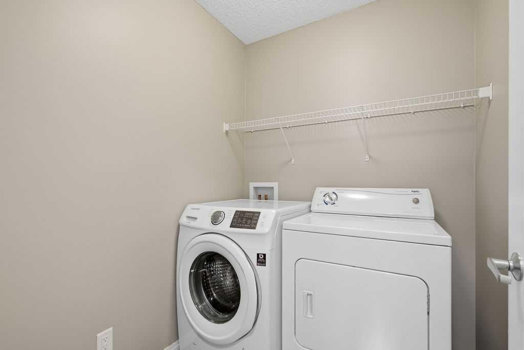 205 Cityscape Gardens Ne, Calgary, AB - Indoor Photo Showing Laundry Room