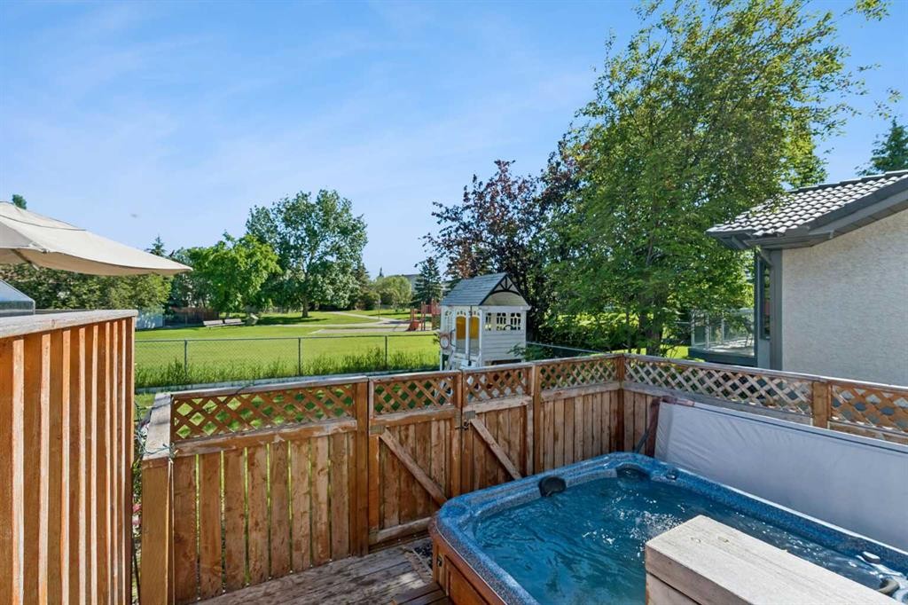 52 West Edge Road, Cochrane, AB - Outdoor With Deck Patio Veranda