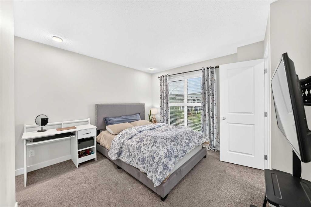 112 Carrington Boulevard Nw, Calgary, AB - Indoor Photo Showing Bedroom