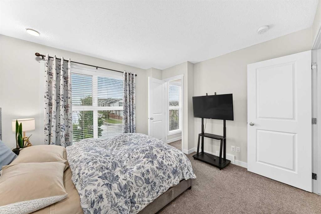 112 Carrington Boulevard Nw, Calgary, AB - Indoor Photo Showing Bedroom