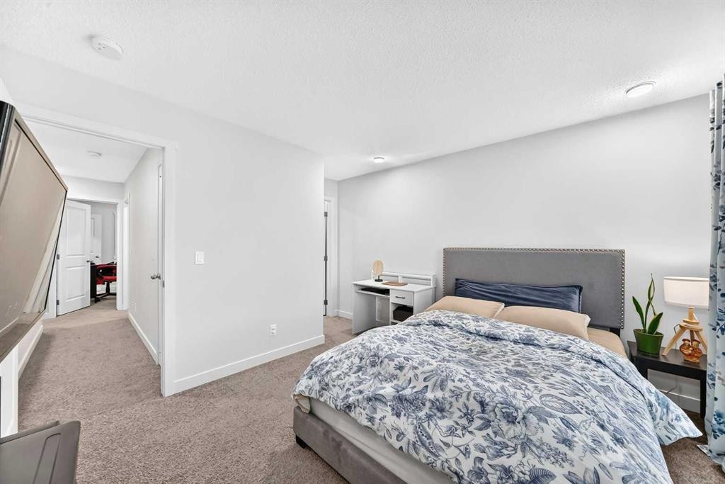 112 Carrington Boulevard Nw, Calgary, AB - Indoor Photo Showing Bedroom