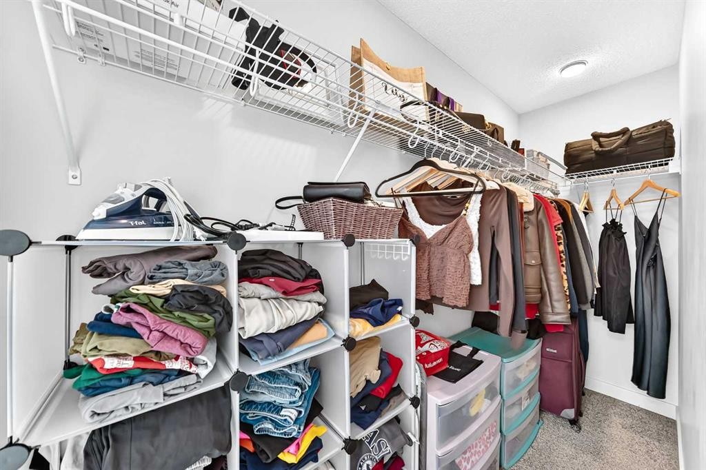 112 Carrington Boulevard Nw, Calgary, AB - Indoor With Storage